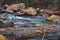 River Oker flowing through the valley Okertal. Wild scenery near the famous Engagement Island Verlobungsinsel at Harz Mountains