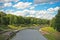 River Ostravice flowing trough park in Ostrava city