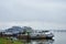 River port berth cruise ships, away bridge, fog low clouds