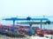 River port. Overhead cranes and sea containers. Marine industry. Sea freight