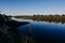 The river with a quiet current and clouds reflected in it, Soz , Gomel, Belarus