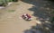 River rafting in Greece above view. People in safety gear on a raft, Vale of Tempi, Thessaly