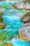 River rapids close up vertical background nature Soca the emerald colored river waters