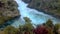 River rapids at huka falls near taupo or rotorua north island new zealand, landscape with water, rocks and trees