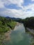 River Reno across Sasso Marconi in a triumph of wild nature between mountains of Appennino in Italy