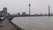 River Rhine at Dusseldorf Germany,view to the shore promenade, in the background Oberkasseler bridge and Tower