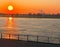 River Rhine near DÃ¼sseldorf, sunset with view to the Oberkasseler bridge, in the foreground railings