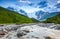 From the river shore opens view on fantastic glacier.