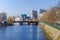 River Spree embankment Helgolaender Ufer with the Moabiter bridge, Spree-Bogen and the Ameron Hotel Abion in Berlin