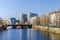 River Spree embankment Helgolaender Ufer with the Moabiter bridge, Spree-Bogen and the Ameron Hotel Abion in Berlin