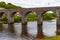 River and stone bridge in Newport, Great Western Greenway trail