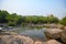 River stream waterfall in forest landscape, beautiful nature water stream with rocks in the tropical forest little mountain