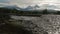 River Studenaya and Kluchevskaya group of volcanoes at dawn.