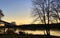 River Sunset with Bridge in Background