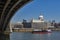 The River Thames under Blackfriars Bridge with St Paul Cathedral, famous and recognizable religious sight of London in England, UK