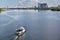 A river tram carries tourists along the Dnipro River along the left bank of Kyiv, top view