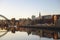 River Tyne marina on Newcastle Quayside at golden hour with calm reflection on water