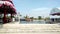 River view from concrete waterfront stairs, boat running to opposite shore