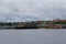 River view of the port of Manaus with a lot of colorful stacked containers. Location: Manaus, Brazil