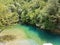 River Voidomatis in summer people for pick nick under the green trees Greece