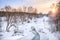 river Vorya, covered with ice with dark thawed patches