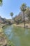 The River Walk at San Antonio Texas with winding canal flanked by trails