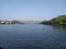 River water boat trees sky