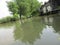 River water on the edge of fish and shrimp farmer settlements