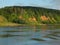 River water and forest on mountain coast landscape