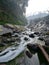 River water green with volcanic sulphur content flowing in East Java