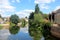 River Welland, Stamford, Lincolnshire, with houses and trees along the banks.