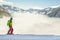 A river of white fog in the mountains and skier in front are preparing for the descent.Alpine Alps mountain landscape at Tirol,