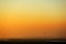 River and windmill at dawn