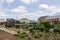 Riverfront Plaza on the Mississippi river with office buildings, the River Center in the city skyline, lush green trees and plants