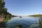 Riverscape, beautiful blue water of the river, panoramic image, river, greenery, moss, water, beautiful river photo.