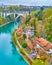 The riverside of Aare river with its buildings and walking promenade of Altenberg district in Bern, Switzerland