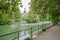 Riverside of isar river munich, with blooming red chestnut trees