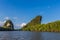 The riverside and mountains : Khao Khanab Nam paralled hills to water, a symbol of Krabi Province of Thailand.