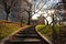 Riverside Park on the Upper West Side of New York City during Autumn with Curving Steps and a Shining Sun