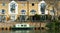 Riverside residences with small narrow boat on the river Ouse at St Neots.