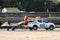 RNLI Lifeboat four wheel drive 4x4 parked on sandy beach watching surfers