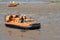 RNLI Rescue Hovercraft with crew on beach