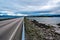 Road 64 to Bolsoy Bridge or Bolsoybrua that crosses the Bolsoysund strait between mainland and island of Bolsoya.  Norway