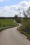 Road in agricultural landscape in Mecklenburg-Vorpommern, Germany