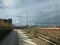 The road along the railroad tracks with a large number of ways with high-speed trains in Scandinavia on a sunny day