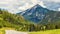 Road in Alpine mountains, Switzerland. Panoramic view of route in Alps