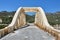 A road arched bridge over a dried river