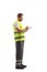 Road assistance worker in a reflective vest writing a document