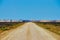 Road in the Australian Outback with heat haze creating a mirage