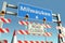 Road barricades near Milwaukee city road sign. Lockdown in the United States conceptual 3D rendering